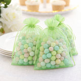 Colorful pastel candy-filled bags for party favors or decorations.