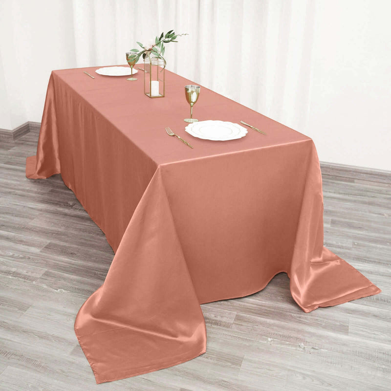 Dusty rose satin tablecloth on a banquet table