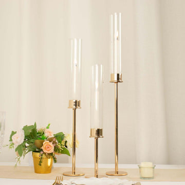 Set of 3 Tall Gold Metal Taper Candlestick Holders, Clear Glass Hurricane Candle Stands With Chimney Candle Shades 16", 20", 24"