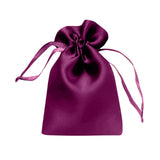 Purple satin drawstring bag with a tied ribbon closure #whtbkgd
