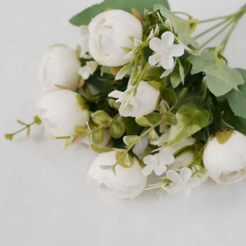 Ivory ranunculus and greenery bouquet