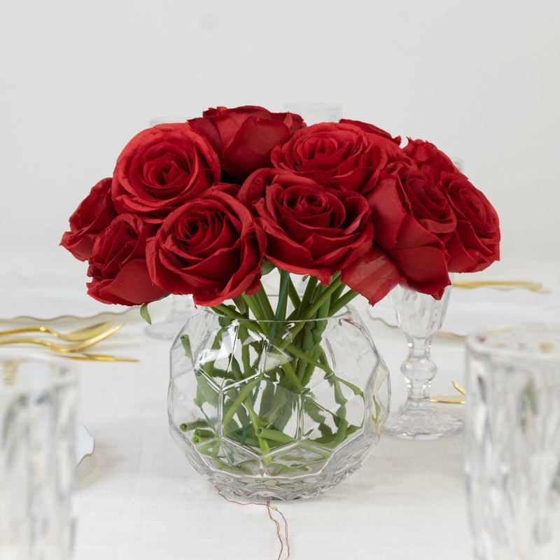 Red silk rose bouquet in a glass vase