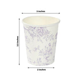 Decorative paper cup with floral design, 3.5 inches tall and 2 inches wide.