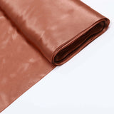Brown satin fabric roll on a white background 