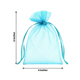 Turquoise organza gift bag, 6 inches tall and 4 inches wide.