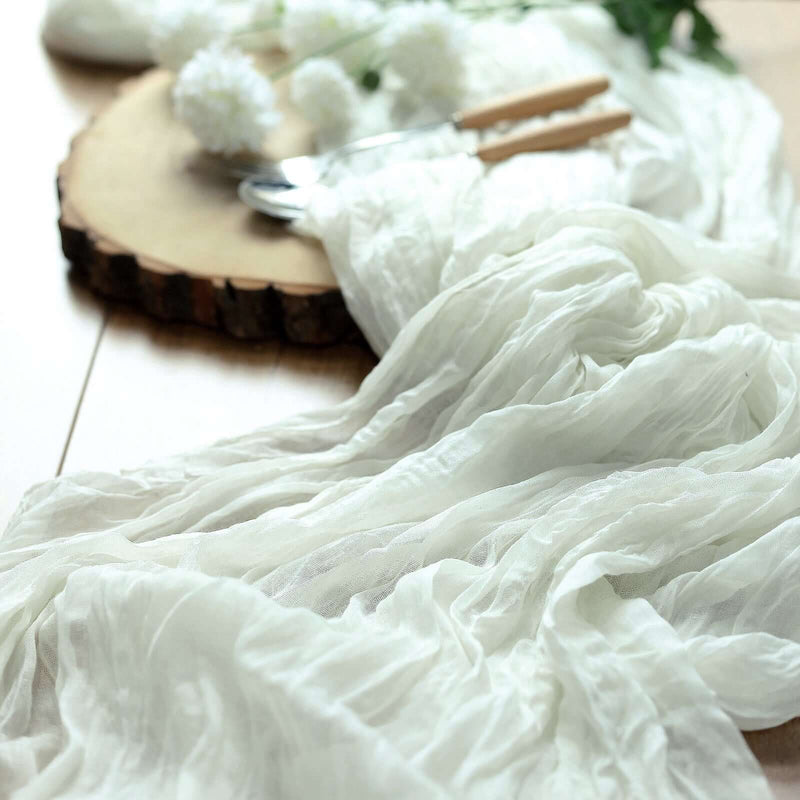 White gauze fabric draped over a table