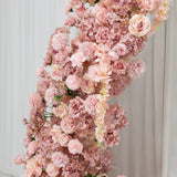 Pink floral arrangement with roses and hydrangeas on a white backdrop. #whtbkgd