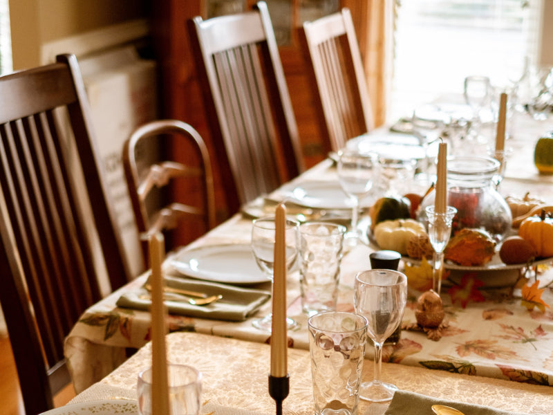 Outdoor table setting with plates and flowers
