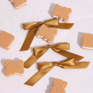 Add a Touch of Elegance with Gold Satin Ribbon Bows