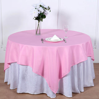 Add Elegance to Your Event with the 70x70 Pink Square Seamless Polyester Table Overlay