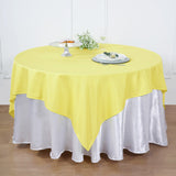 Add Elegance to Your Event with a Yellow Square Seamless Polyester Table Overlay