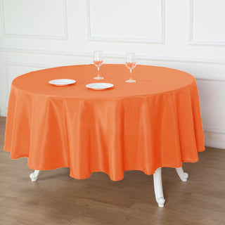 The Perfect Addition to Your Orange Event Decor: 90" Orange Seamless Polyester Round Tablecloth