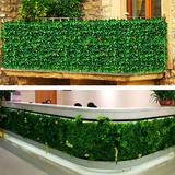 Artificial green hedge panel for indoor and outdoor decoration.