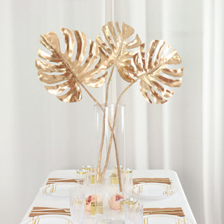 Add a Touch of Luxury with Metallic Gold Artificial Monstera Leaf Stems