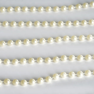 Enhance Your Event Decor with 12 Yards of Ivory Faux Craft Pearl String