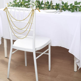 Create a Timeless and Luxurious Atmosphere with Gold Faux Pearl Chair Decor