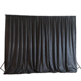 Black fabric backdrop for photography or events.