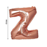 Rose gold number "2" balloon, 40 inches tall.