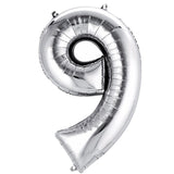 Silver number 9 balloon on a plain background