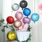 Colorful balloons in various shades arranged at a festive decor setup.