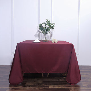 Enhance Your Event Decor with the Burgundy Seamless Square Polyester Tablecloth