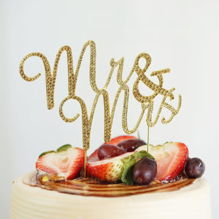 Elegant Gold Rhinestone Cake Topper for a Glamorous Wedding