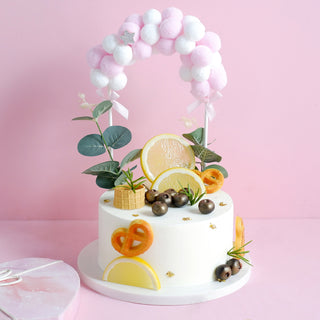Add a Pop of Pink and White with the Cotton Ball Arch Cake Topper