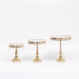 Set of three elegant gold cake stands with crystal accents #whtbkgd