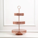 Three-tiered rose gold serving stand with intricate lace design