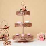 Rose gold three-tier cake stand with macarons and floral accents