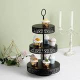 Black three-tier cupcake stand with assorted cupcakes on display.