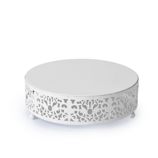 White round coffee table with intricate cutout design and smooth top