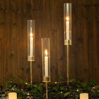 Create Memorable Events with Gold Metal Clear Glass Hurricane Candle Stands