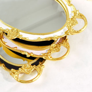 Elevate Your Vanity Display with the Metallic Gold/Pink Oval Resin Decorative Vanity Serving Tray