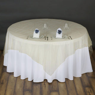Elevate Your Event with the Champagne Organza Table Overlay