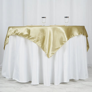 Enhance Your Event Decor with the 60"x60" Champagne Square Smooth Satin Table Overlay