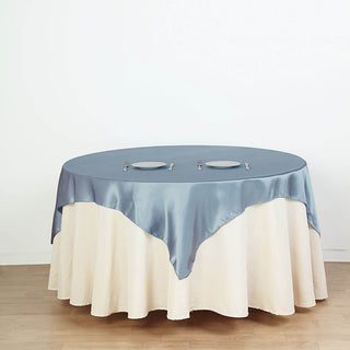 Elevate Your Event Decor with the Dusty Blue Square Smooth Satin Table Overlay