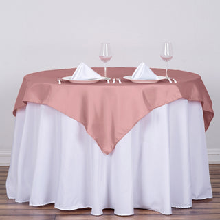 Add Elegance to Your Event with the Dusty Rose Square Seamless Polyester Table Overlay