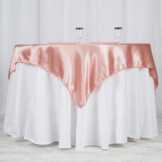 Enhance Your Event Decor with the 60"x60" Dusty Rose Square Smooth Satin Table Overlay
