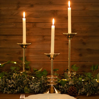 Create a Memorable Atmosphere with Gold Metal Taper Candle Stands