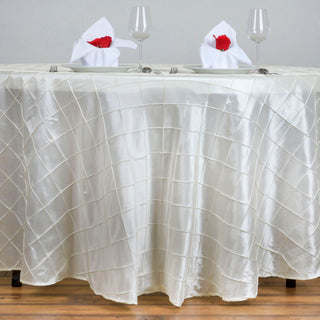 Elevate Your Event Decor with the Ivory Pintuck Round Seamless Tablecloth