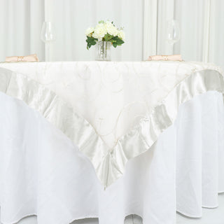 Add Elegance to Your Table with the 60"x60" Ivory Embroidered Sheer Organza Square Table Overlay