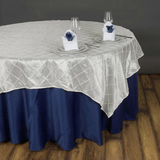 Create Unforgettable Memories with our Ivory Pintuck Square Table Overlay