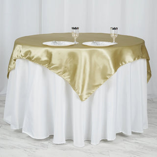 Add a Touch of Elegance with the 60"x60" Champagne Square Smooth Satin Table Overlay