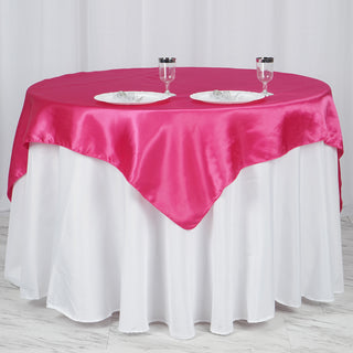 Create a Stunning Table Setting with the Fuchsia Square Smooth Satin Table Overlay