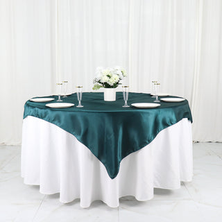 Add a Touch of Elegance with the Peacock Teal Square Satin Table Overlay