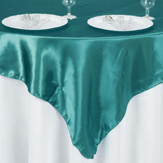 Create a Festive Atmosphere with the Turquoise Square Satin Table Overlay