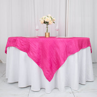 Add Elegance to Your Event with the Fuchsia Accordion Crinkle Taffeta Table Overlay