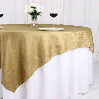 Enhance Your Dining Experience with the Gold Accordion Crinkle Taffeta Table Overlay