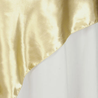 Enhance Your Event Decor with the Champagne Satin Overlay